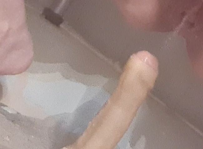 Thumbnail of pissed on dildo while showering