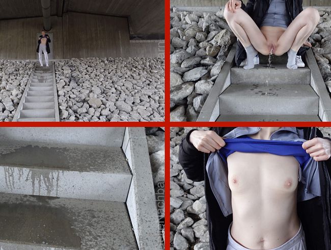 Golden shower in the open air - stripped bare under the motorway bridge.