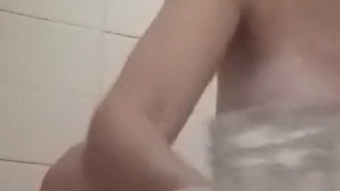 Thumbnail of "My first golden rain shower on my new tits and it feels so warm." (no sound)