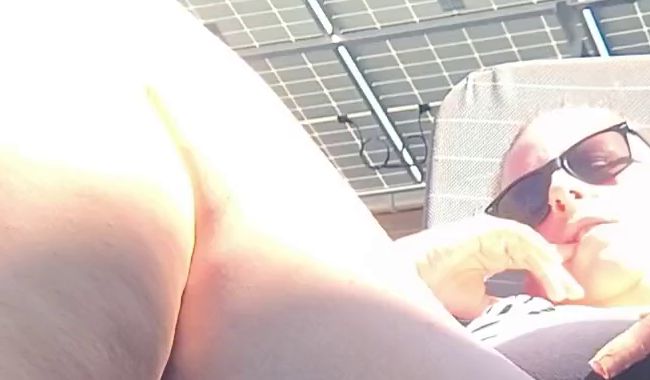 Thumbnail of Ns in the garden sunbathing